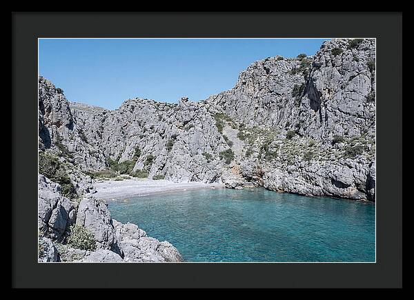 Cove Nestled Between Tall Cliffs