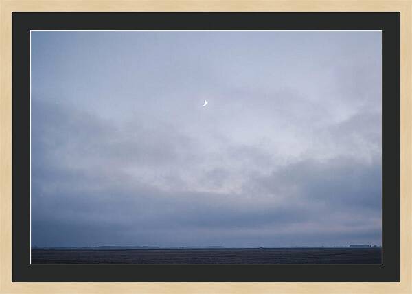 Crescent Moon In Twilight Sky