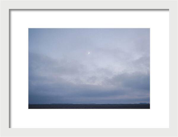 Crescent Moon In Twilight Sky