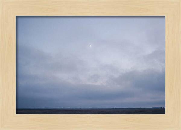 Crescent Moon In Twilight Sky