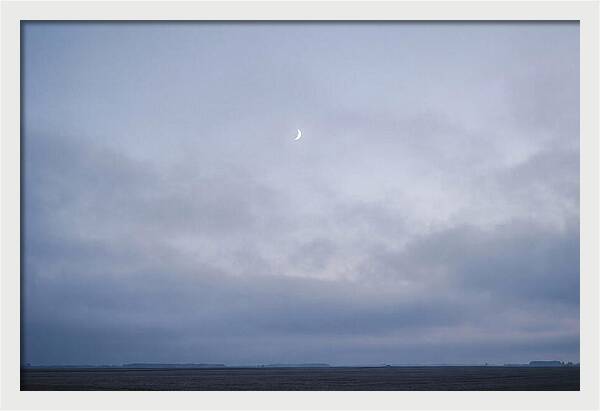 Crescent Moon In Twilight Sky