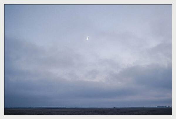 Crescent Moon In Twilight Sky