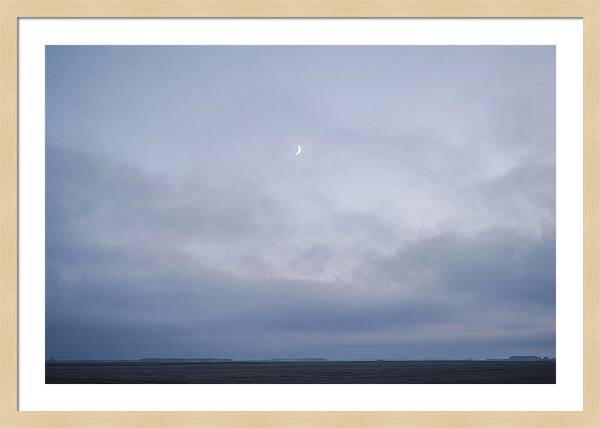 Crescent Moon In Twilight Sky