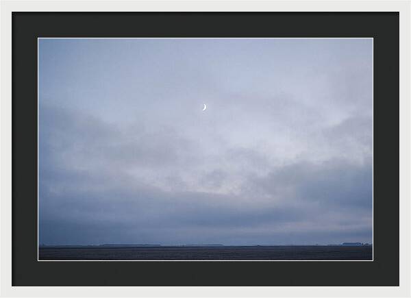 Crescent Moon In Twilight Sky