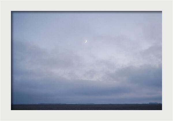 Crescent Moon In Twilight Sky