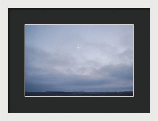 Crescent Moon In Twilight Sky