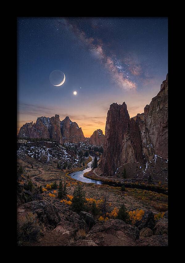 Crescent Moon Over Majestic Peaks