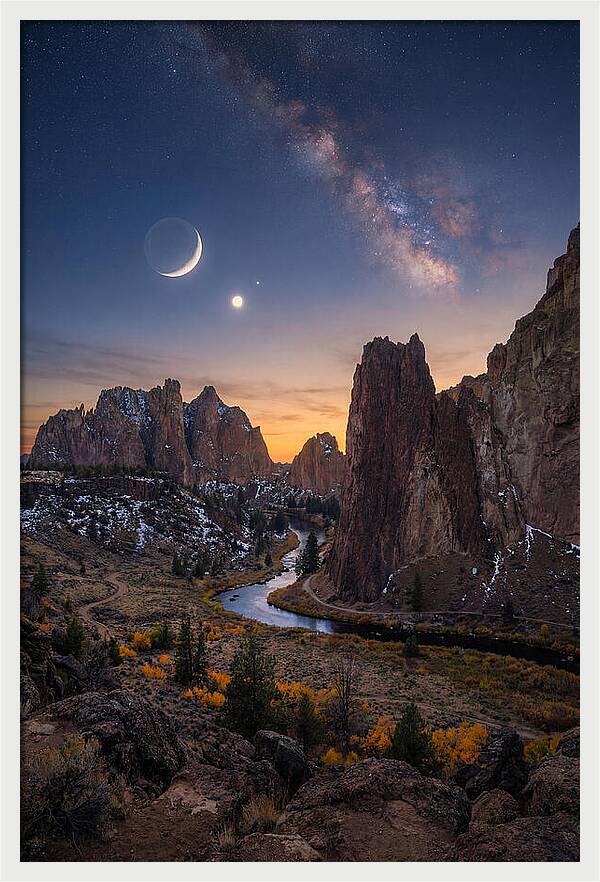 Crescent Moon Over Majestic Peaks