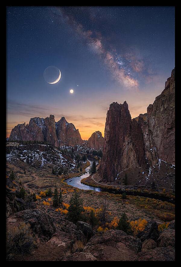 Crescent Moon Over Majestic Peaks