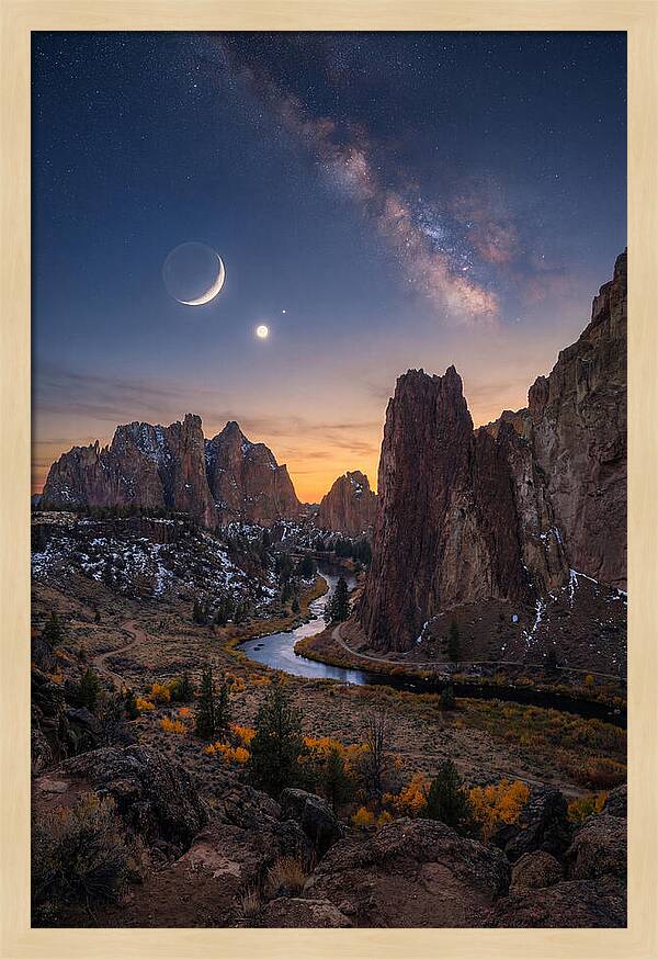 Crescent Moon Over Majestic Peaks