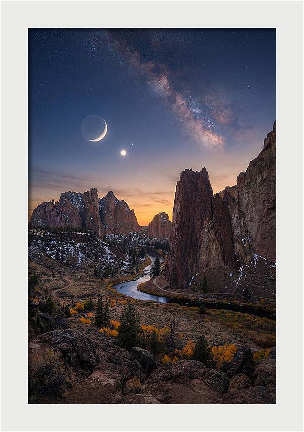 Crescent Moon Over Majestic Peaks