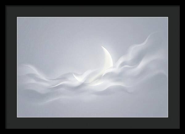 Crescent Moon Through Wispy Clouds