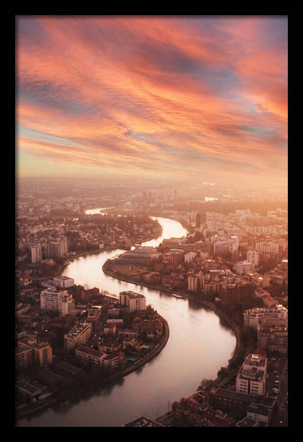 Curved River Through Cityscape