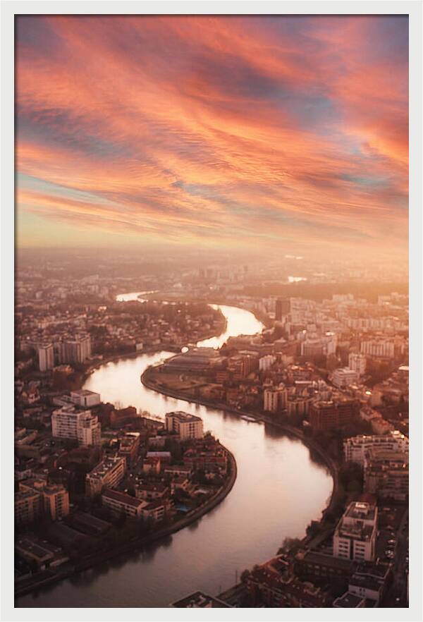 Curved River Through Cityscape