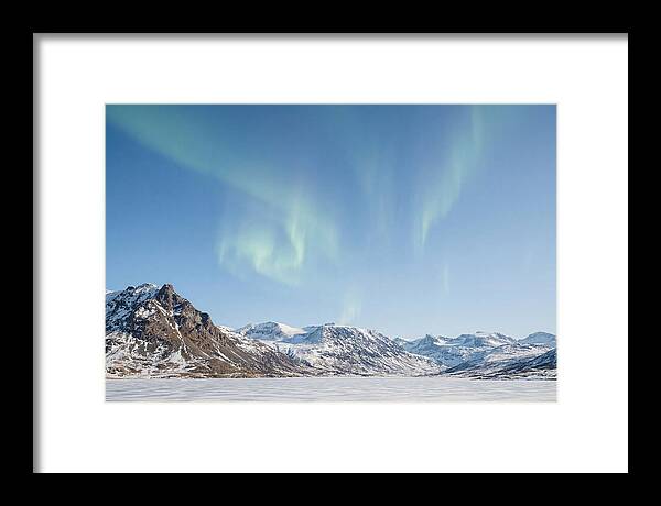 Dancing Aurora Borealis Over Mountains