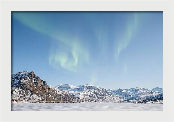 Dancing Aurora Borealis Over Mountains