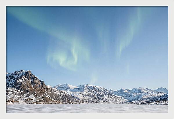 Dancing Aurora Borealis Over Mountains