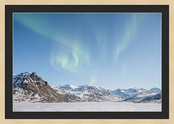 Dancing Aurora Borealis Over Mountains