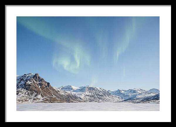 Dancing Aurora Borealis Over Mountains