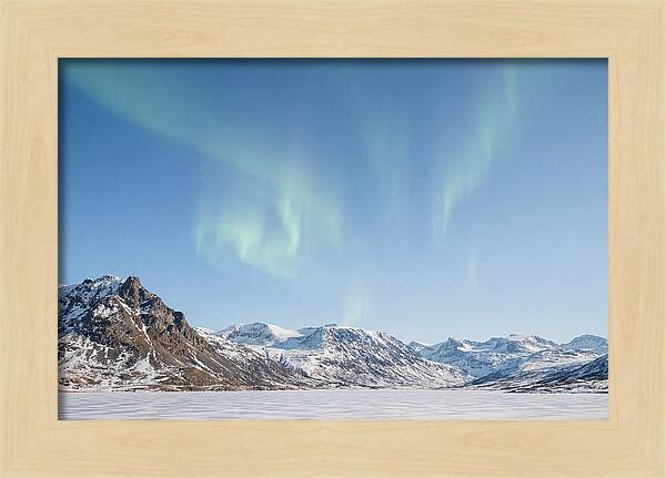 Dancing Aurora Borealis Over Mountains
