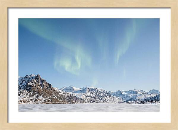 Dancing Aurora Borealis Over Mountains