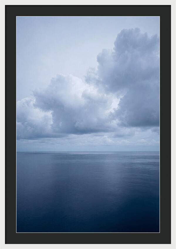 Deep Blue Ocean Under Towering Cumulus