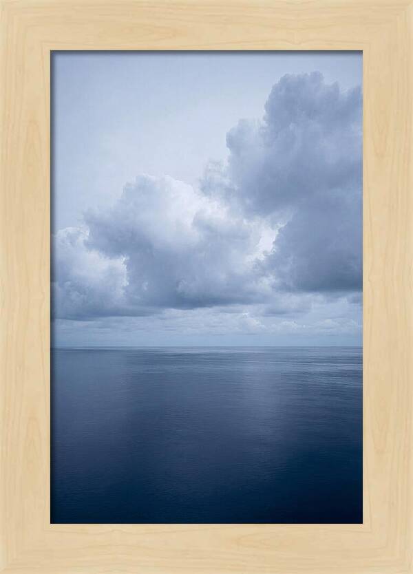 Deep Blue Ocean Under Towering Cumulus