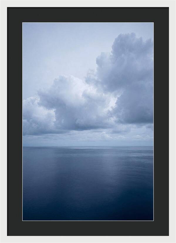 Deep Blue Ocean Under Towering Cumulus