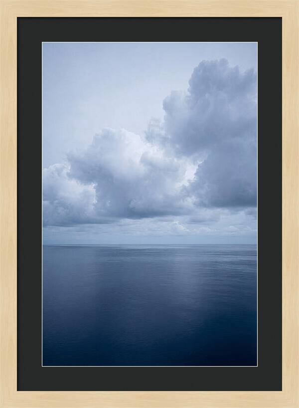 Deep Blue Ocean Under Towering Cumulus