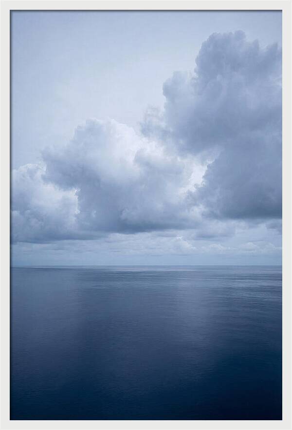 Deep Blue Ocean Under Towering Cumulus