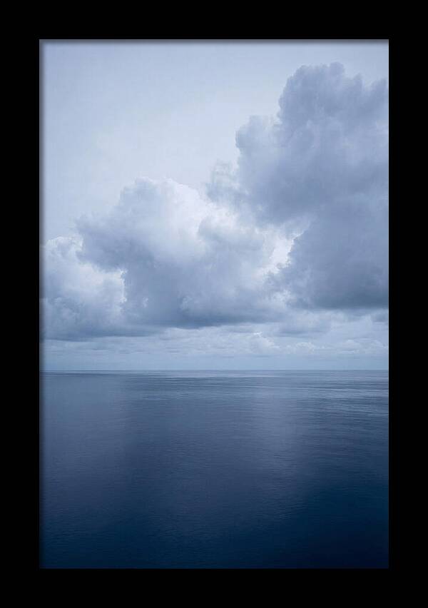 Deep Blue Ocean Under Towering Cumulus