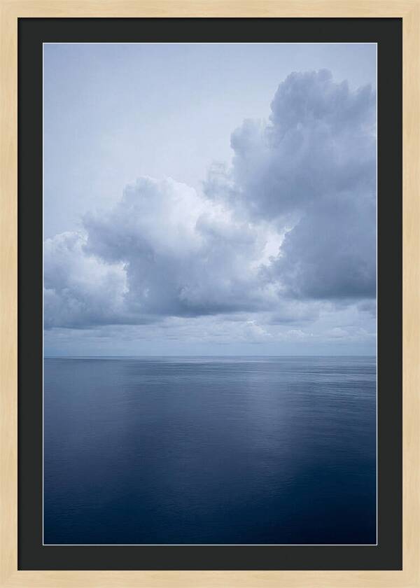 Deep Blue Ocean Under Towering Cumulus
