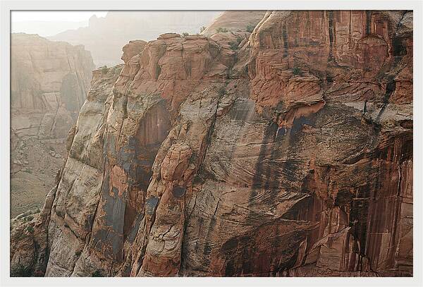 Desert Varnish Streaks On Red Canyon Wall