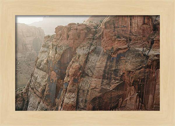 Desert Varnish Streaks On Red Canyon Wall