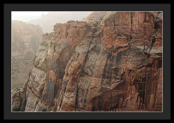 Desert Varnish Streaks On Red Canyon Wall