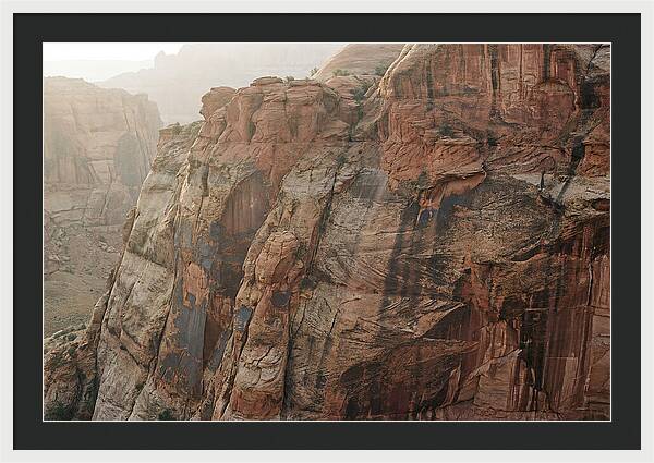 Desert Varnish Streaks On Red Canyon Wall
