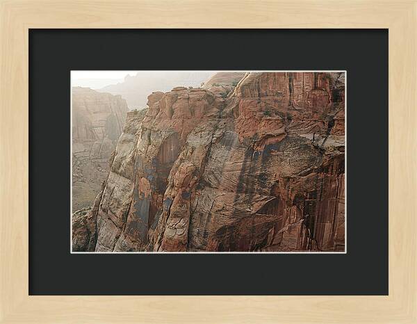 Desert Varnish Streaks On Red Canyon Wall