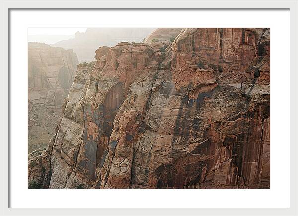 Desert Varnish Streaks On Red Canyon Wall