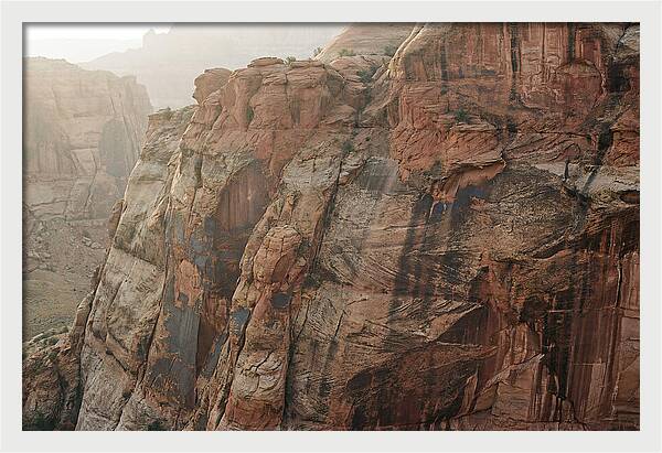 Desert Varnish Streaks On Red Canyon Wall