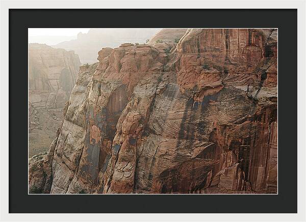 Desert Varnish Streaks On Red Canyon Wall