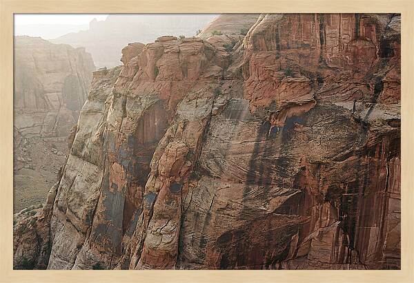 Desert Varnish Streaks On Red Canyon Wall