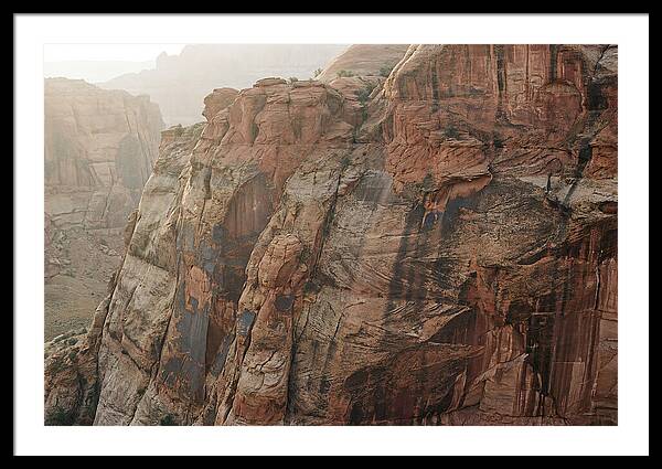 Desert Varnish Streaks On Red Canyon Wall