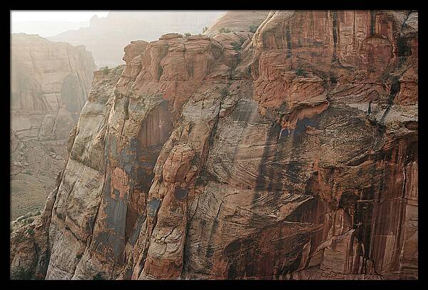 Desert Varnish Streaks On Red Canyon Wall
