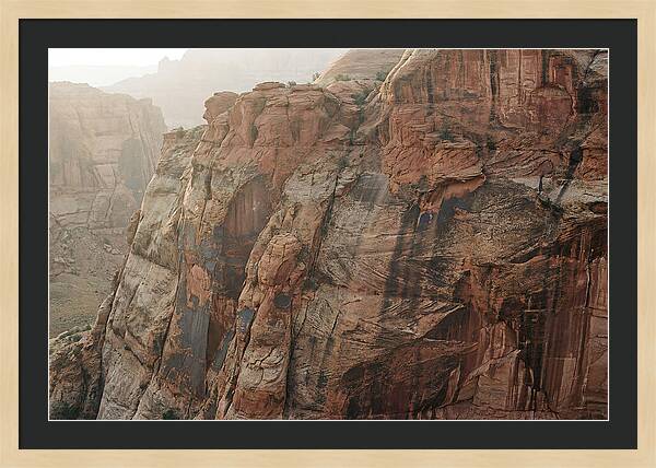 Desert Varnish Streaks On Red Canyon Wall