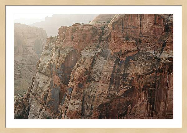 Desert Varnish Streaks On Red Canyon Wall