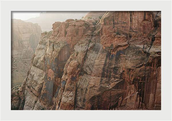 Desert Varnish Streaks On Red Canyon Wall