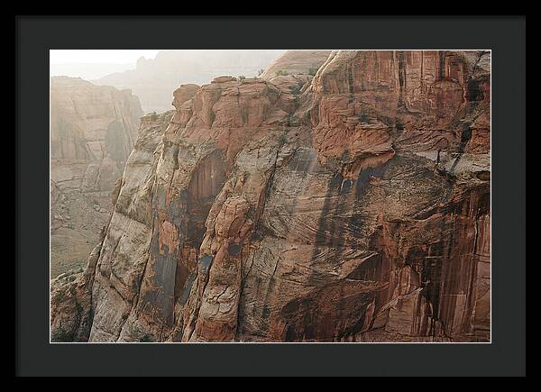 Desert Varnish Streaks On Red Canyon Wall