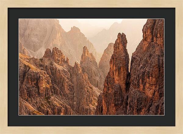 Dolomite Spires Bathed In Golden Light