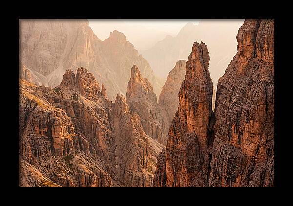 Dolomite Spires Bathed In Golden Light