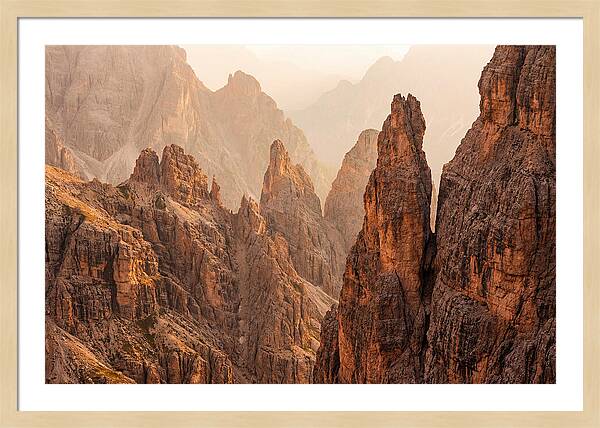 Dolomite Spires Bathed In Golden Light